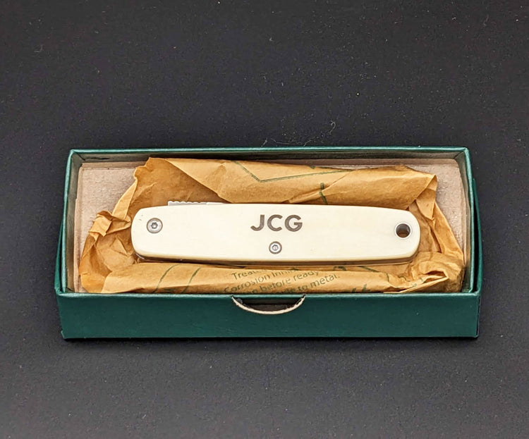 Engraved bone-handle knife