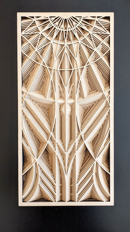 Laser-cut layered art